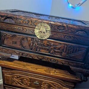 Intricately Carved Wooden Chest with Brass Accents